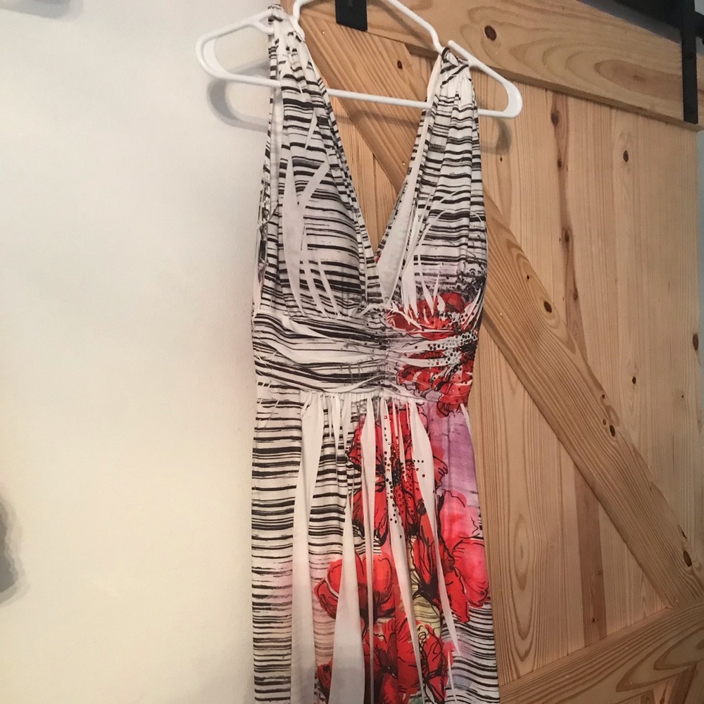 Dress with low neckline and back.